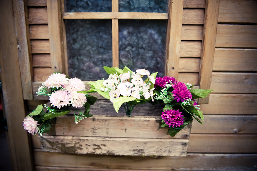 Window boxes in bloom on the playhouse